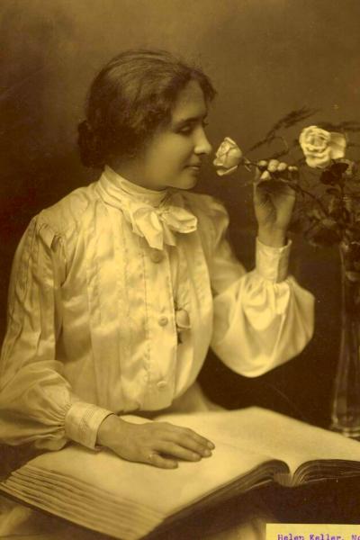 Helen Keller Smelling a Flower